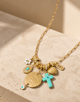 MADAMIRMA - SAUTOIR CHARMS DORÉS - CROIX TURQUOISE