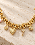 JORGINA - BRACELET DORÉ GROSSE MAILLE AVEC PAMPILLES