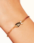 BE MAAD - Bracelet poisson beige/obsidienne dorée