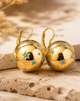 GAS BIJOUX - Boucles d'oreilles COMETE grand modèle dorées à l'or fin et cristaux verts