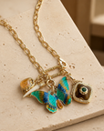GAS BIJOUX - COLLIER CONSTANTINE DORÉE - CHARMS PAPILLON TONS DE BLEUS
