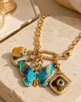 GAS BIJOUX - COLLIER CONSTANTINE DORÉE - CHARMS PAPILLON TONS DE BLEUS