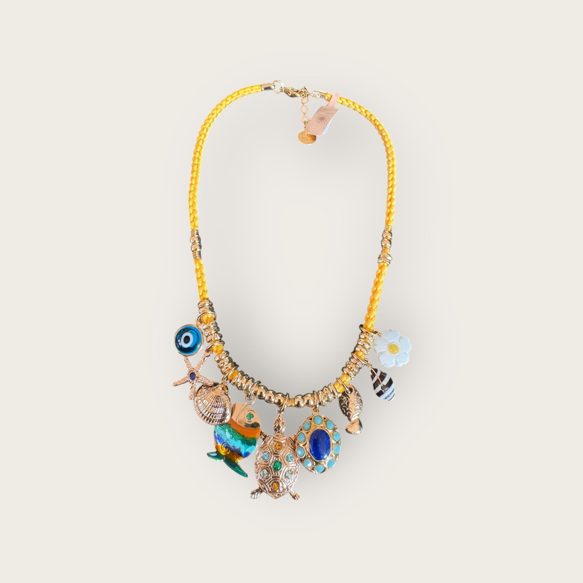 GAS BIJOUX - Collier BELLAGIO en métal doré sur cordon jaune avec charm's - Pièce unique