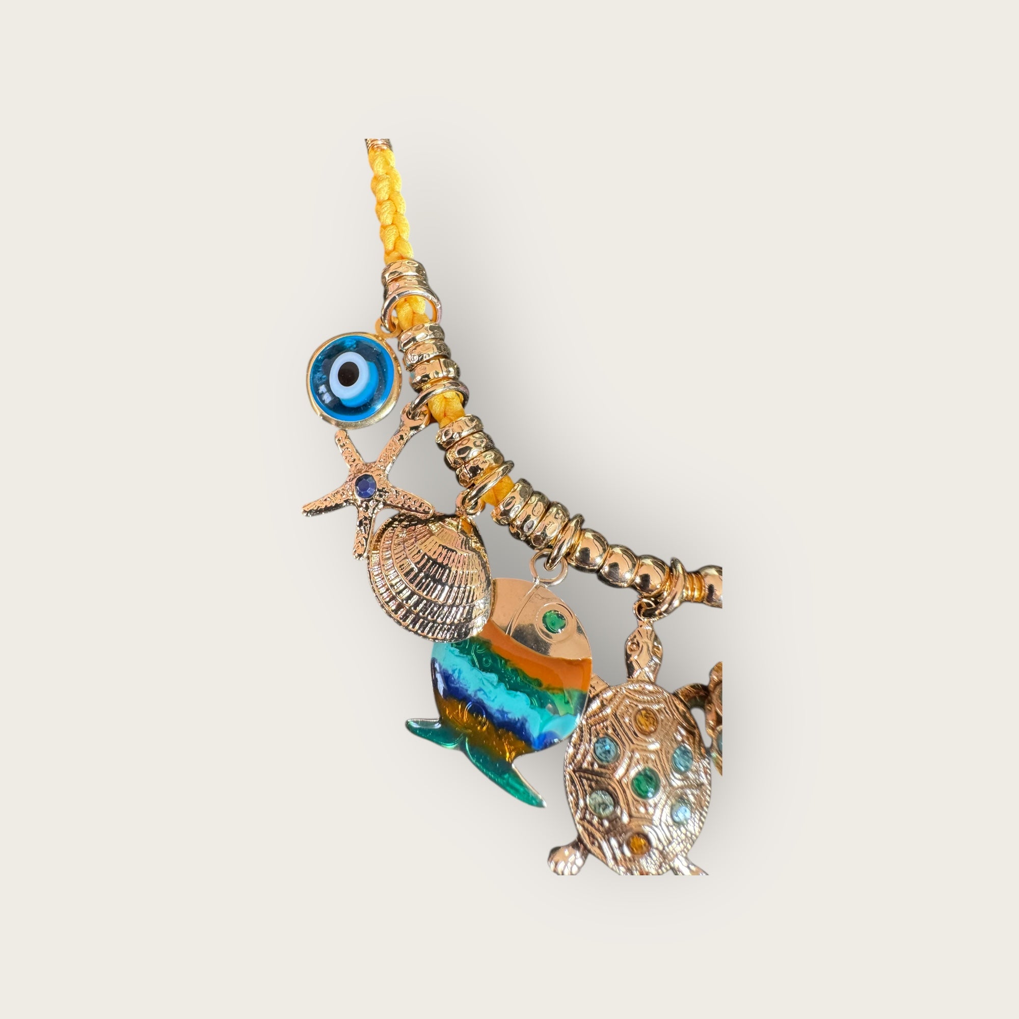 GAS BIJOUX - Collier BELLAGIO en métal doré sur cordon jaune avec charm's - Pièce unique