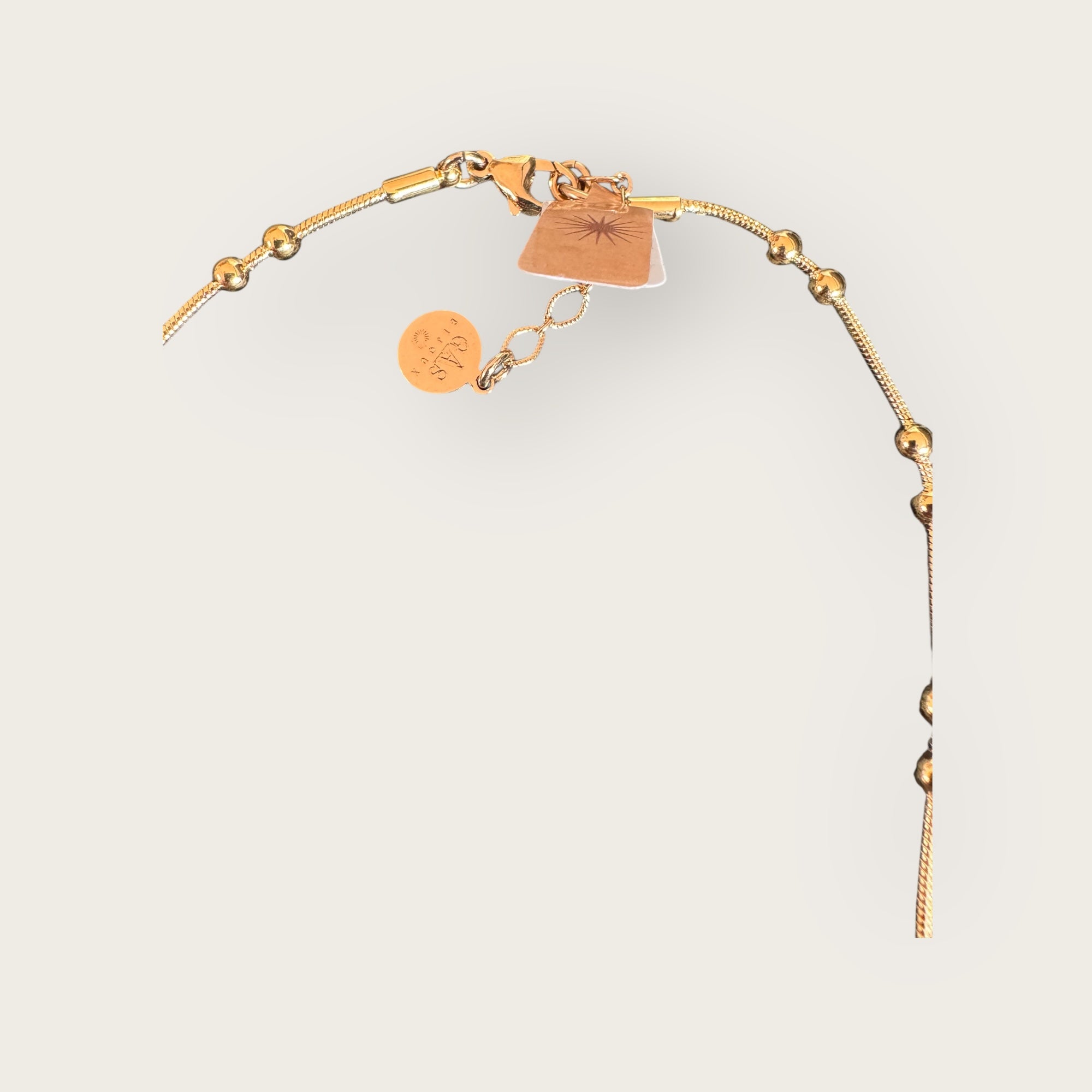 GAS BIJOUX - Collier BELLAGIO en métal doré sur cordon jaune avec charm's - Pièce unique