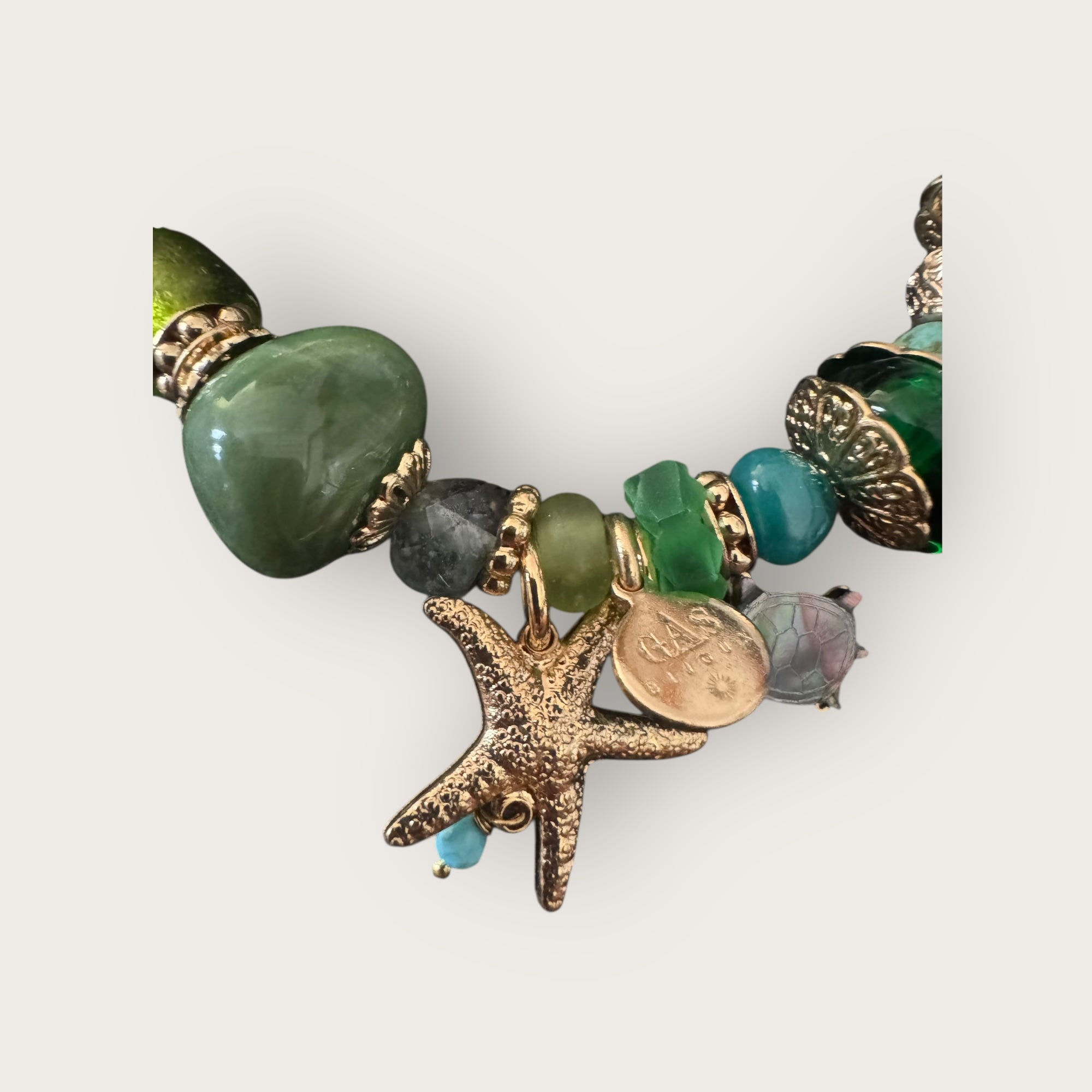 GAS BIJOUX - Bracelet KAMAE COKI doré à l'or fin - Charm's Etoile de mer et tortue en nacre grise