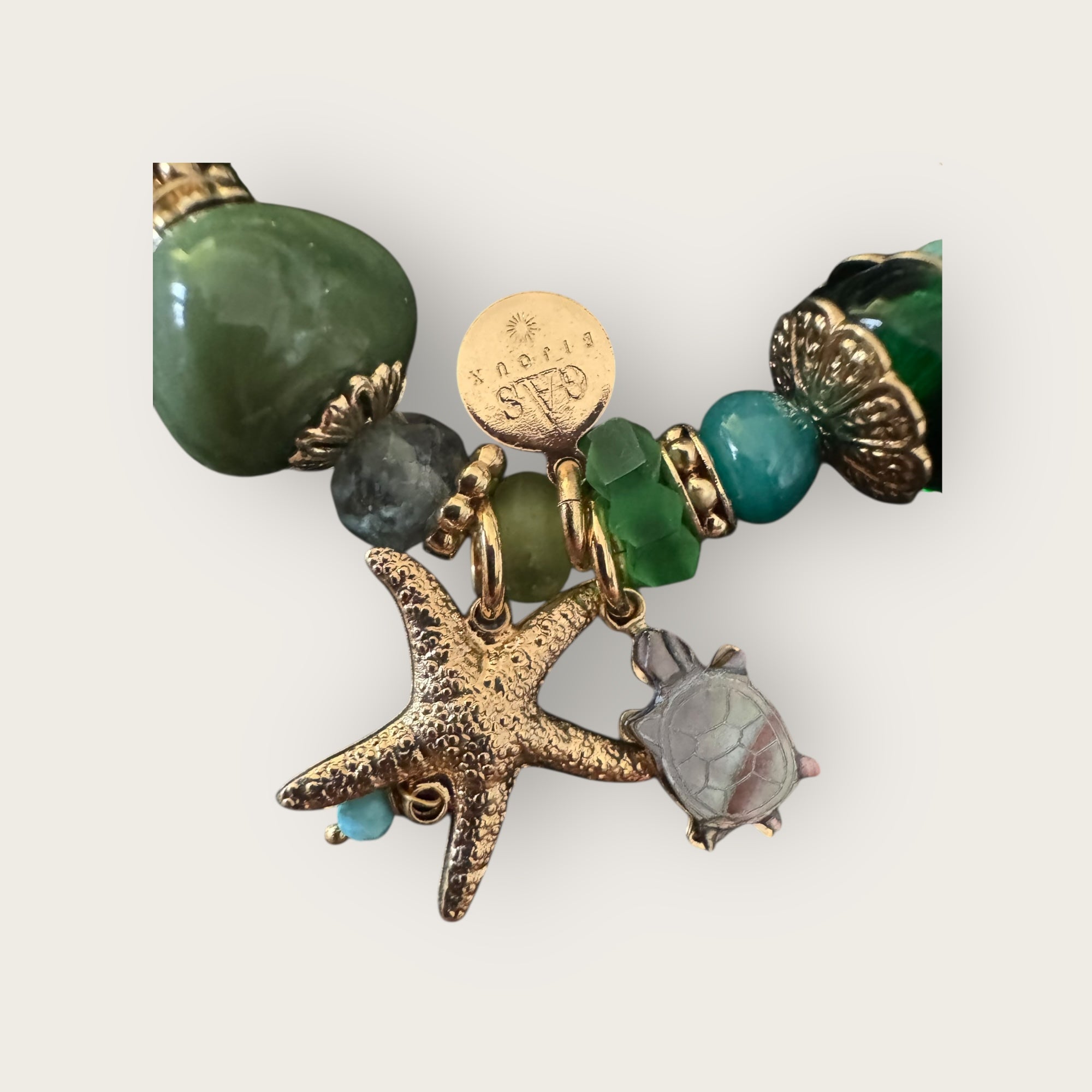 GAS BIJOUX - Bracelet KAMAE COKI doré à l'or fin - Charm's Etoile de mer et tortue en nacre grise
