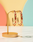 GAS BIJOUX - BOUCLES D'OREILLES MAORINA doré à l'or fin avec de l'acétate orange a l'intérieur