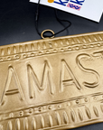Plaque murale doré NAMASTE