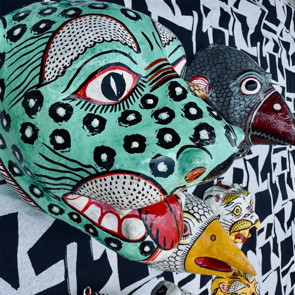 Masque léopard vert artisanal en papier mâché, Odisha Inde