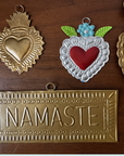 Plaque murale doré NAMASTE