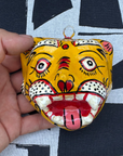 Masque décoration murale Inde tigre jaune 10cm papier mâché