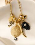 MADAMIRMA - SAUTOIR CHARMS DORÉ - MAIN NOIRE