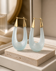 GAS BIJOUX - BOUCLES D'OREILLES ECUME ACETATE DOREES - BLEUES TRANSLUCIDES