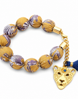 EXVOTOBYNATGAP - BRACELETS BOULES TISSUS AVEC TETE DE TIGRE - 3 COULEURS