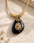 GAS BIJOUX - COLLIER GALET TREFLE DORÉ - ONYX NOIR