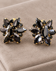 JORGINA - BOUCLES D'OREILLES DORÉES - CRISTAUX BLACK