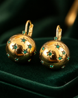GAS BIJOUX - Boucles d'oreilles COMETE grand modèle dorées à l'or fin et cristaux verts