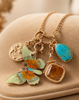 GAS BIJOUX - COLLIER CONSTANTINE DORÉ - PAPILLON VERT PALE ET ORANGE