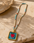 COLLECTION TOPAZE - SAUTOIR "COEUR SACRÉ" TURQUOISE ET OR