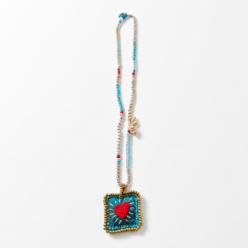 COLLECTION TOPAZE - SAUTOIR "COEUR SACRÉ" TURQUOISE ET OR