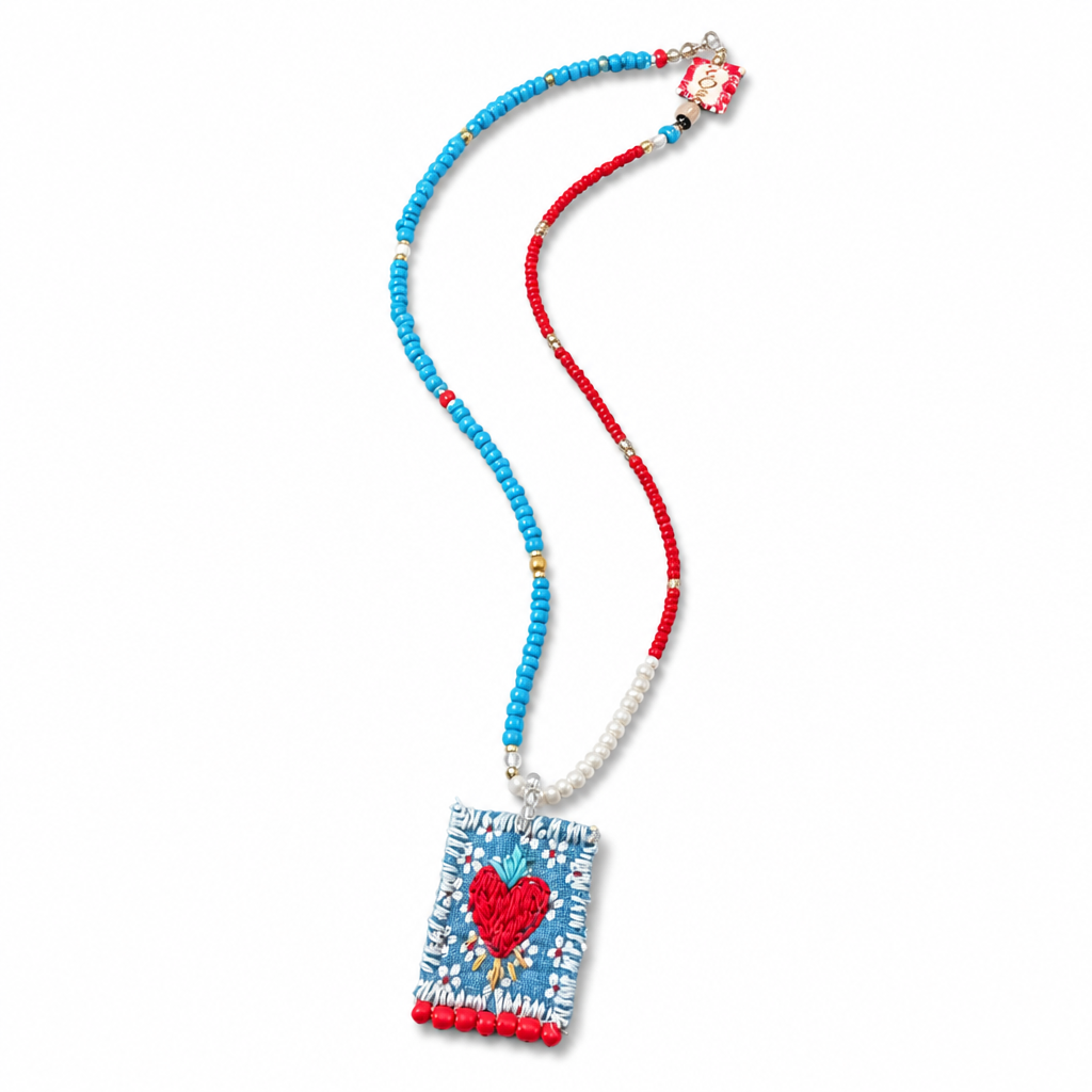 COLLECTION TOPAZE - SAUTOIR "COEUR FLÈCHES" BLEU CIEL ET CORAIL