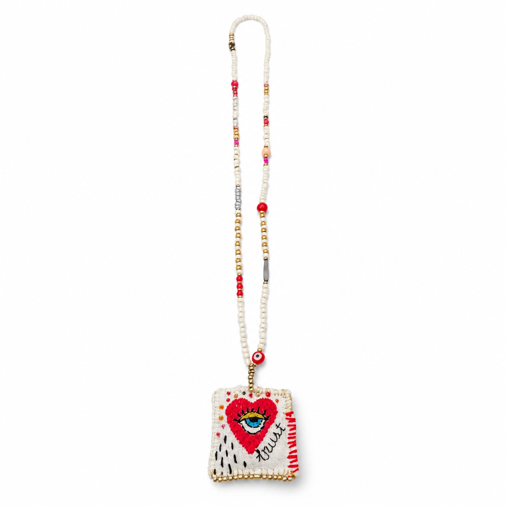 COLLECTION TOPAZE - SAUTOIR "TRUST" COEUR OEIL BLANC ET ROUGE